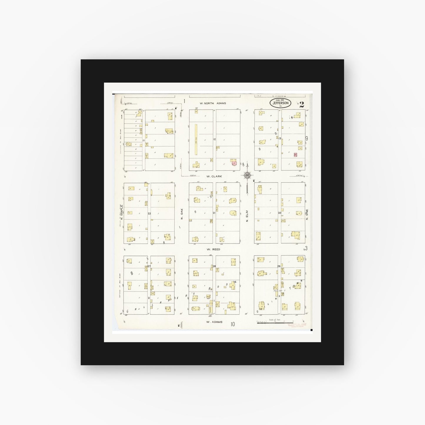 Old map wall art mockup — black gallery frame with white mat — Sanborn Fire Insurance Map from Jefferson, Greene County, Iowa (1915), Sheet #0002