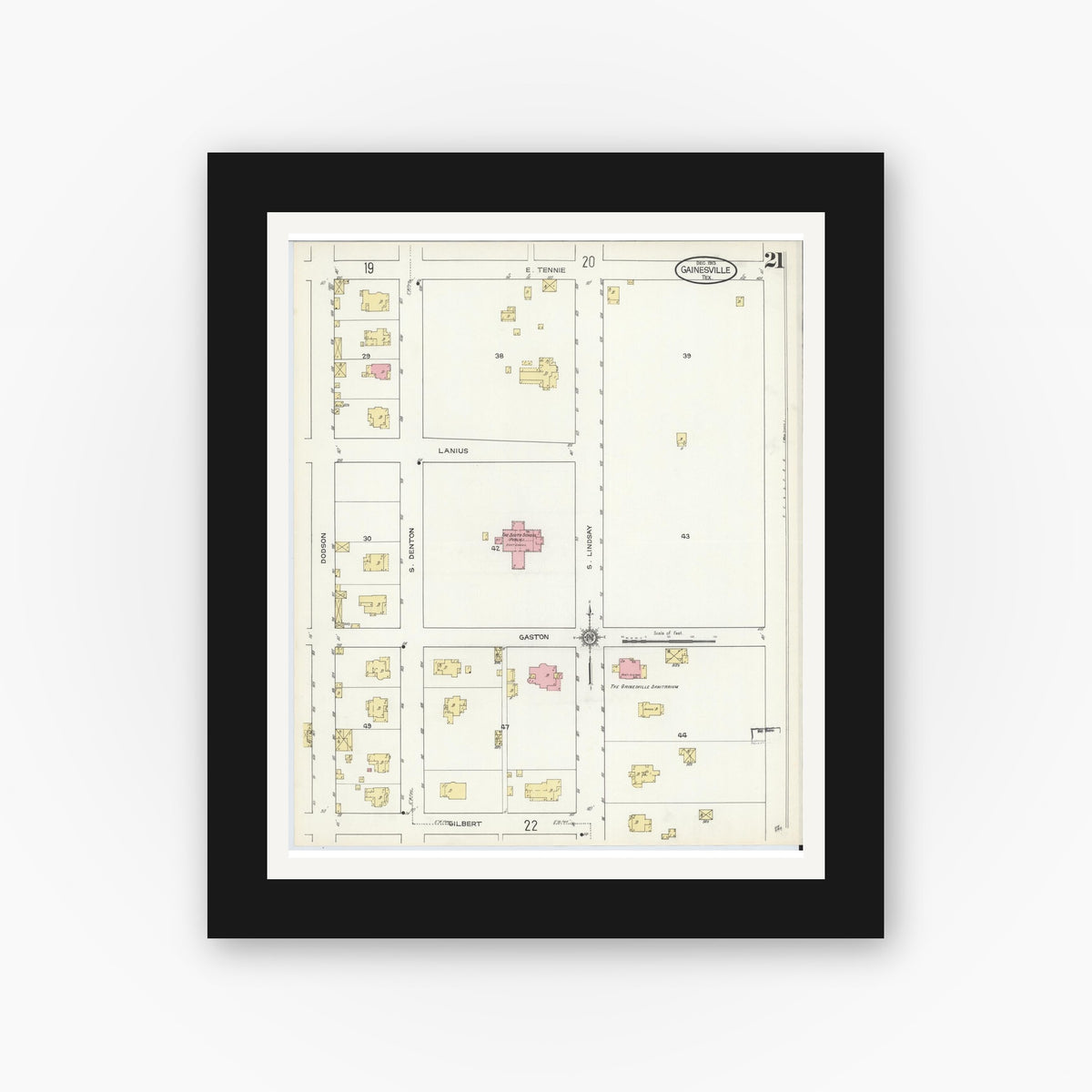 Old map wall art mockup — black gallery frame with white mat — Sanborn Fire Insurance Map from Gainesville, Cooke County, Texas (1913), Sheet #0021