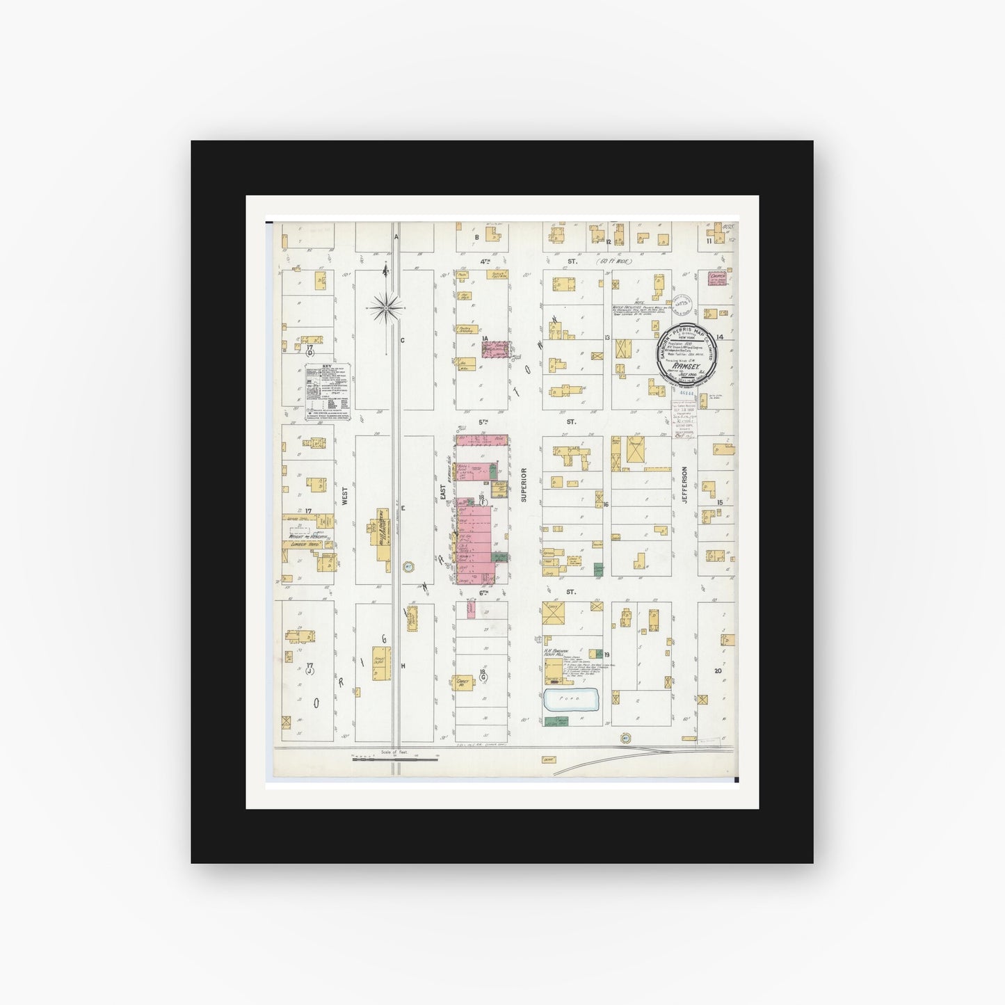 Old map wall art mockup — black gallery frame with white mat — Sanborn Fire Insurance Map from Ramsey, Fayette County, Illinois (1900), Sheet #0001