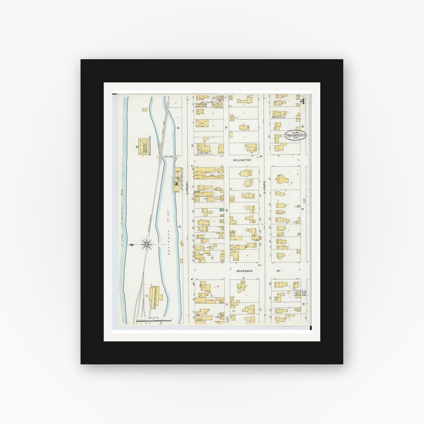 Old map wall art mockup — black gallery frame with white mat — Sanborn Fire Insurance Map from Traverse City, Grand Traverse County, Michigan (1899), Sheet #0004