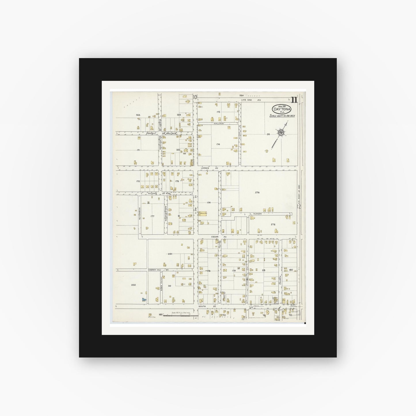 Old map wall art mockup — black gallery frame with white mat — Sanborn Fire Insurance Map from Daytona, Volusia County, Florida (1916), Sheet #0011