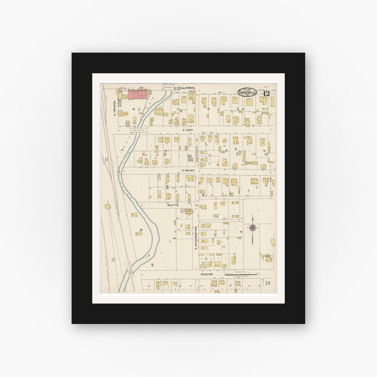 Old map wall art mockup — black gallery frame with white mat — Sanborn Fire Insurance Map from Gainesville, Cooke County, Texas (1922), Sheet #0012