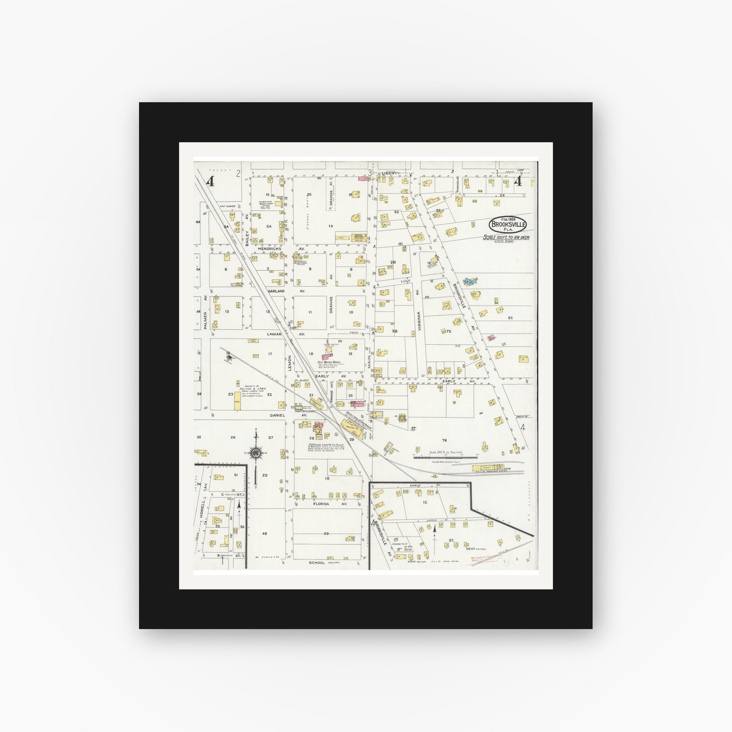 Old map wall art mockup — black gallery frame with white mat — Sanborn Fire Insurance Map from Brooksville, Hernando County, Florida (1924), Sheet #0004