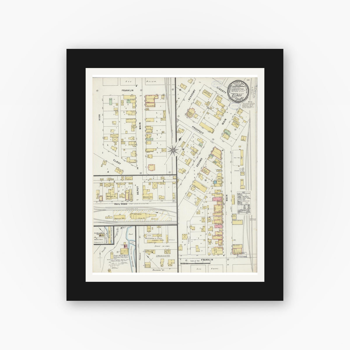 Old map wall art mockup — black gallery frame with white mat — Sanborn Fire Insurance Map from Elroy, Juneau County, Wisconsin (1898), Sheet #0001