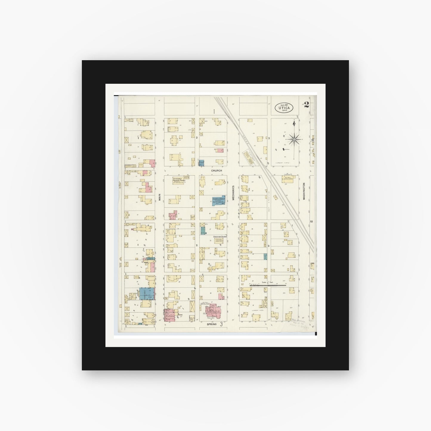 Old map wall art mockup — black gallery frame with white mat — Sanborn Fire Insurance Map from Utica, Licking County, Ohio (1907), Sheet #0002