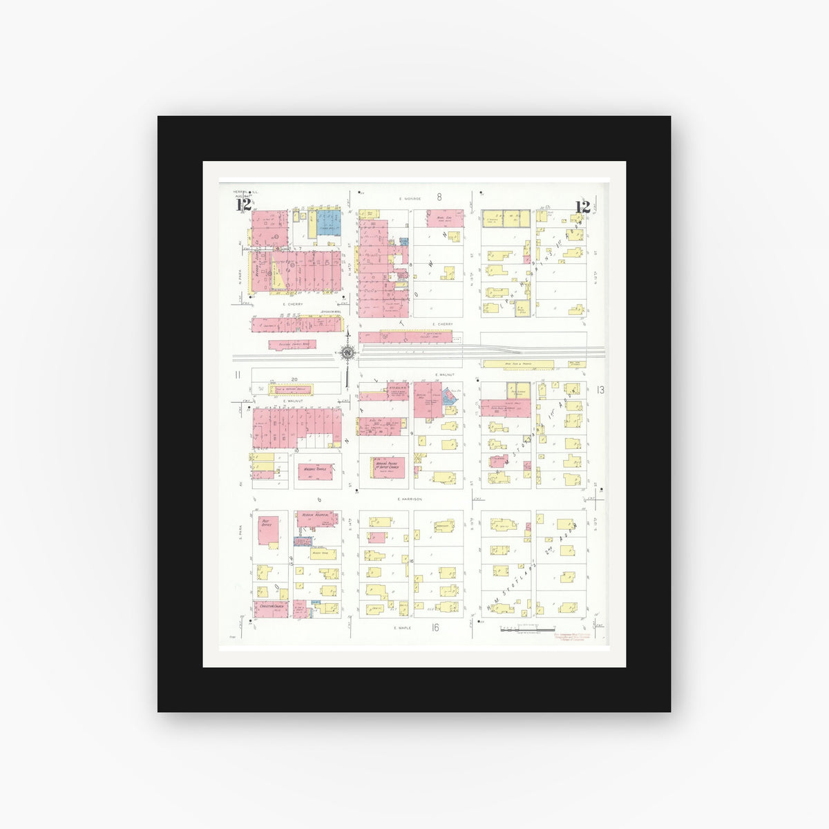 Old map wall art mockup — black gallery frame with white mat — Sanborn Fire Insurance Map from Herrin, Williamson County, Illinois (1941), Sheet #0012