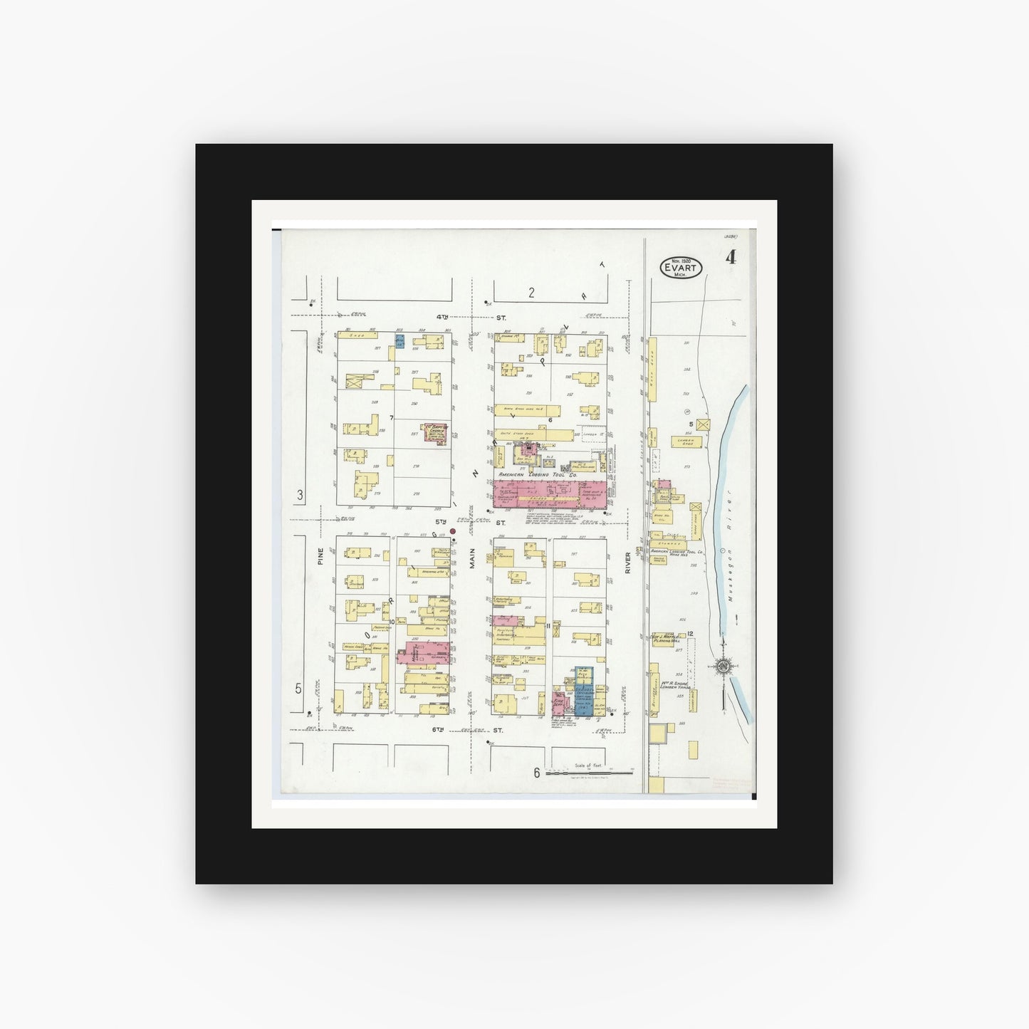 Old map wall art mockup — black gallery frame with white mat — Sanborn Fire Insurance Map from Evart, Osceola County, Michigan (1920), Sheet #0004