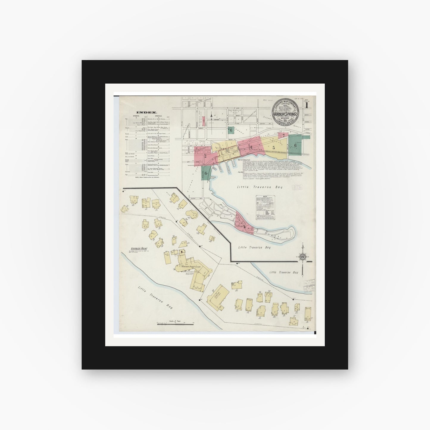 Old map wall art mockup — black gallery frame with white mat — Sanborn Fire Insurance Map from Harbor Springs, Emmet County, Michigan (1912) - Complete Map Set