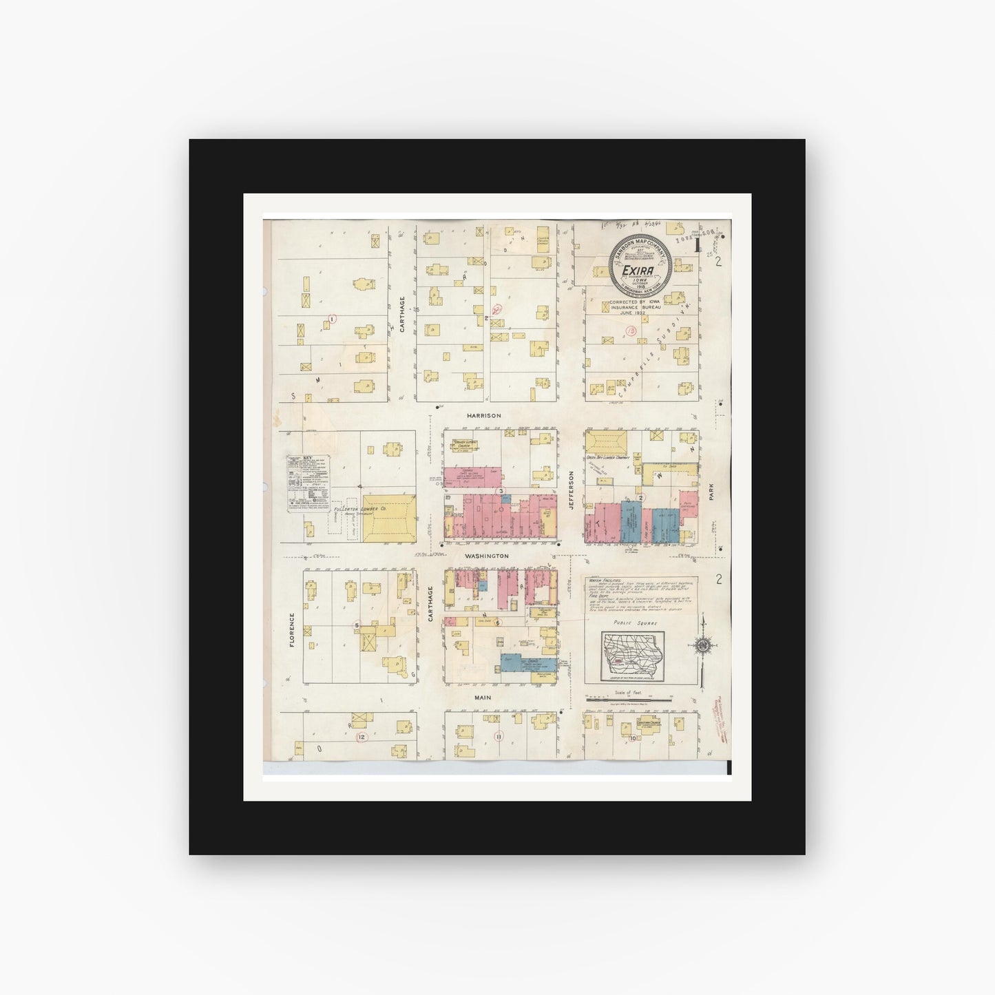 Old map wall art mockup — black gallery frame with white mat — Sanborn Fire Insurance Map from Exira, Audubon County, Iowa (1932), Sheet #0001