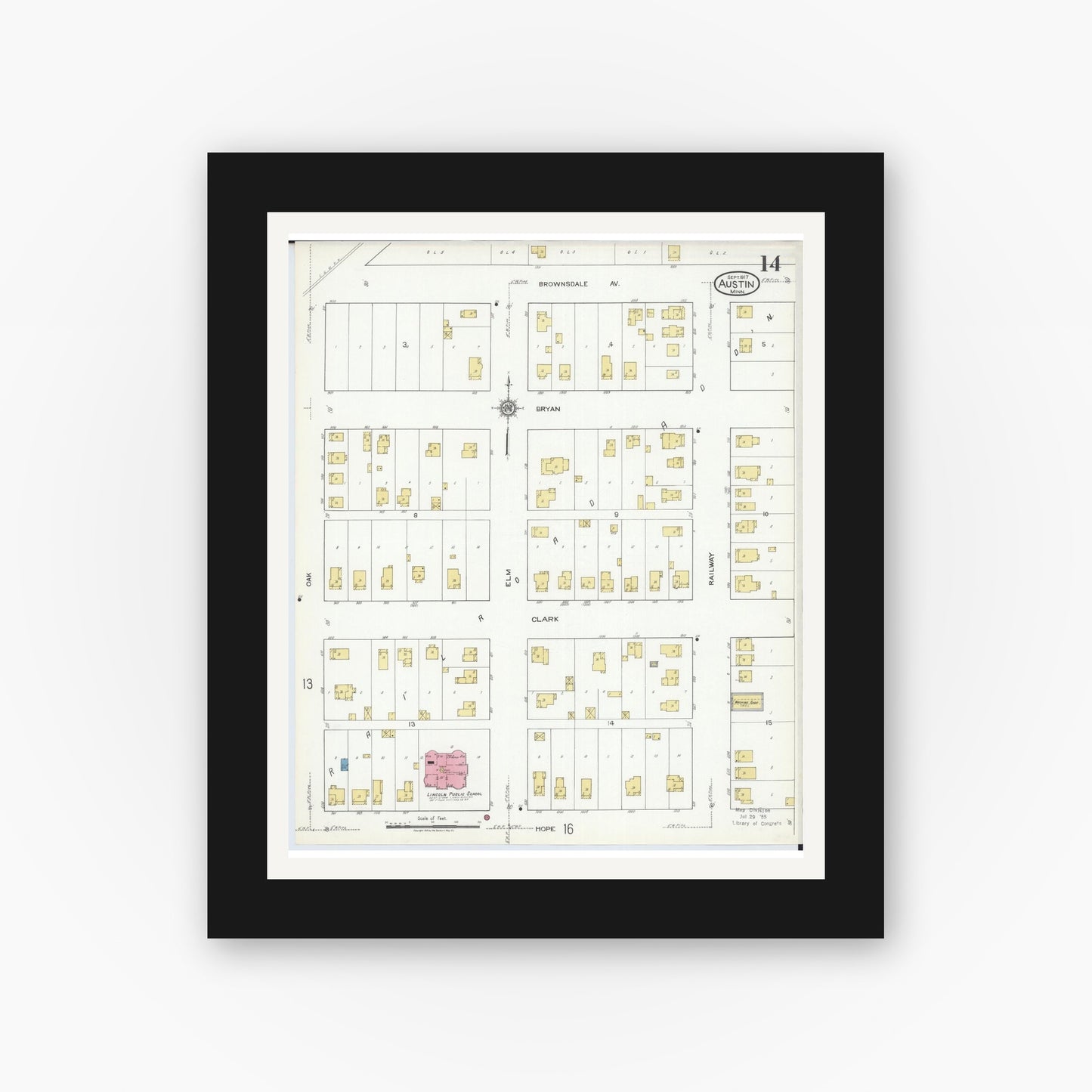 Old map wall art mockup — black gallery frame with white mat — Sanborn Fire Insurance Map from Austin, Mower County, Minnesota (1917), Sheet #0014