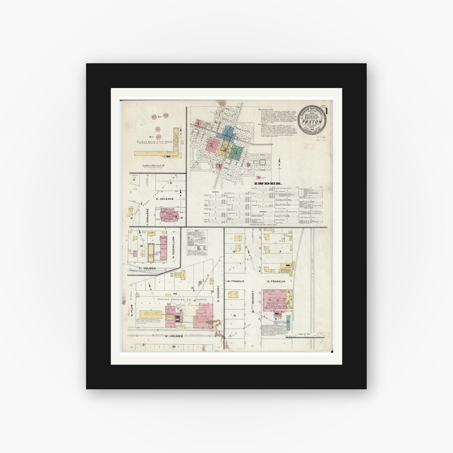 Old map wall art mockup — black gallery frame with white mat — Sanborn Fire Insurance Map from Paxton, Ford County, Illinois (1910) - Complete Map Set