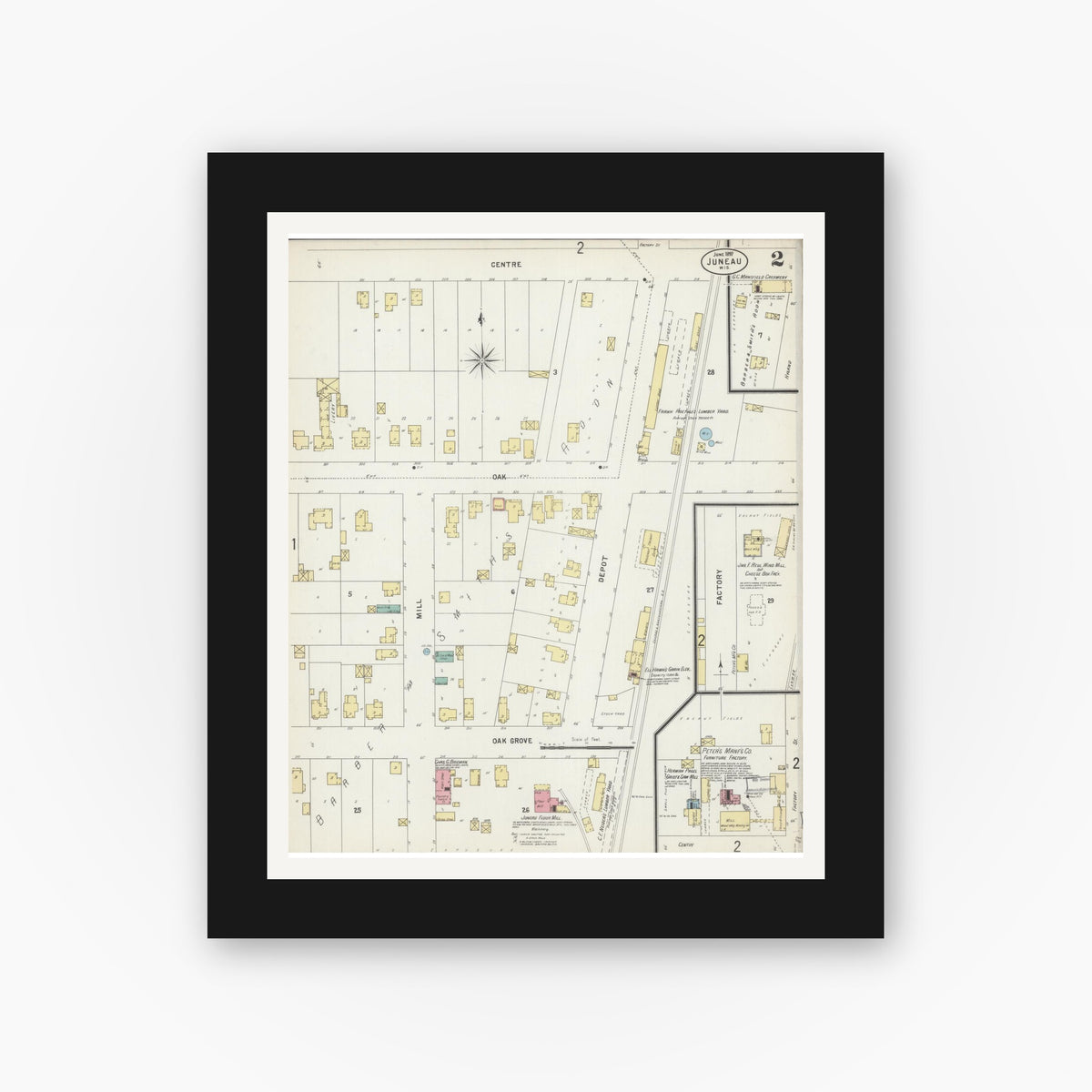 Old map wall art mockup — black gallery frame with white mat — Sanborn Fire Insurance Map from Juneau, Dodge County, Wisconsin (1897), Sheet #0002