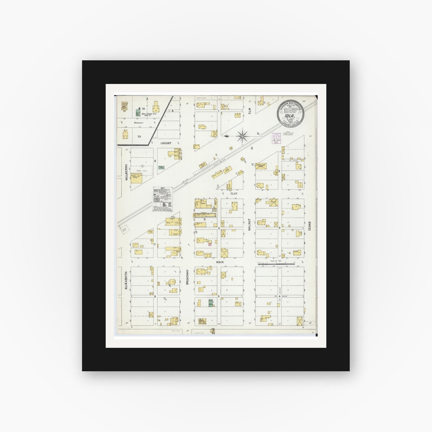 Old map wall art mockup — black gallery frame with white mat — Sanborn Fire Insurance Map from Iola, Clay County, Illinois (1902), Sheet #0001