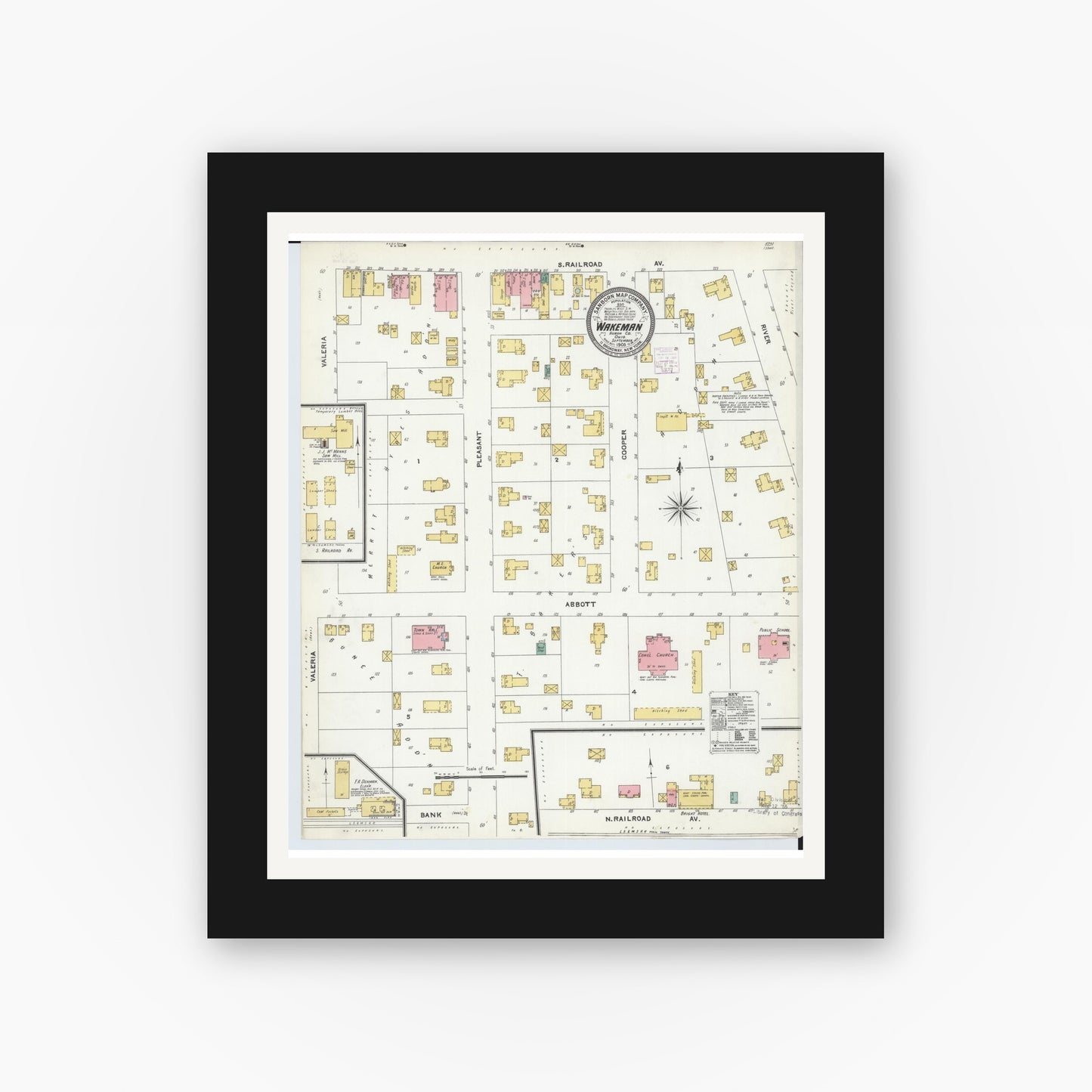 Old map wall art mockup — black gallery frame with white mat — Sanborn Fire Insurance Map from Wakeman, Huron County, Ohio (1905), Sheet #0001