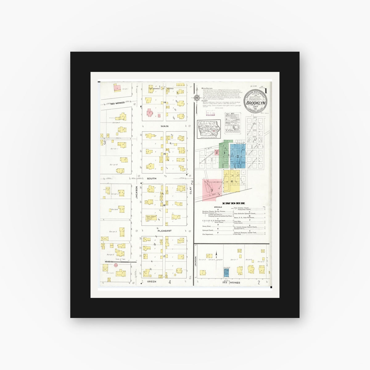 Old map wall art mockup — black gallery frame with white mat — Sanborn Fire Insurance Map from Brooklyn, Poweshiek County, Iowa (1916), Sheet #0001