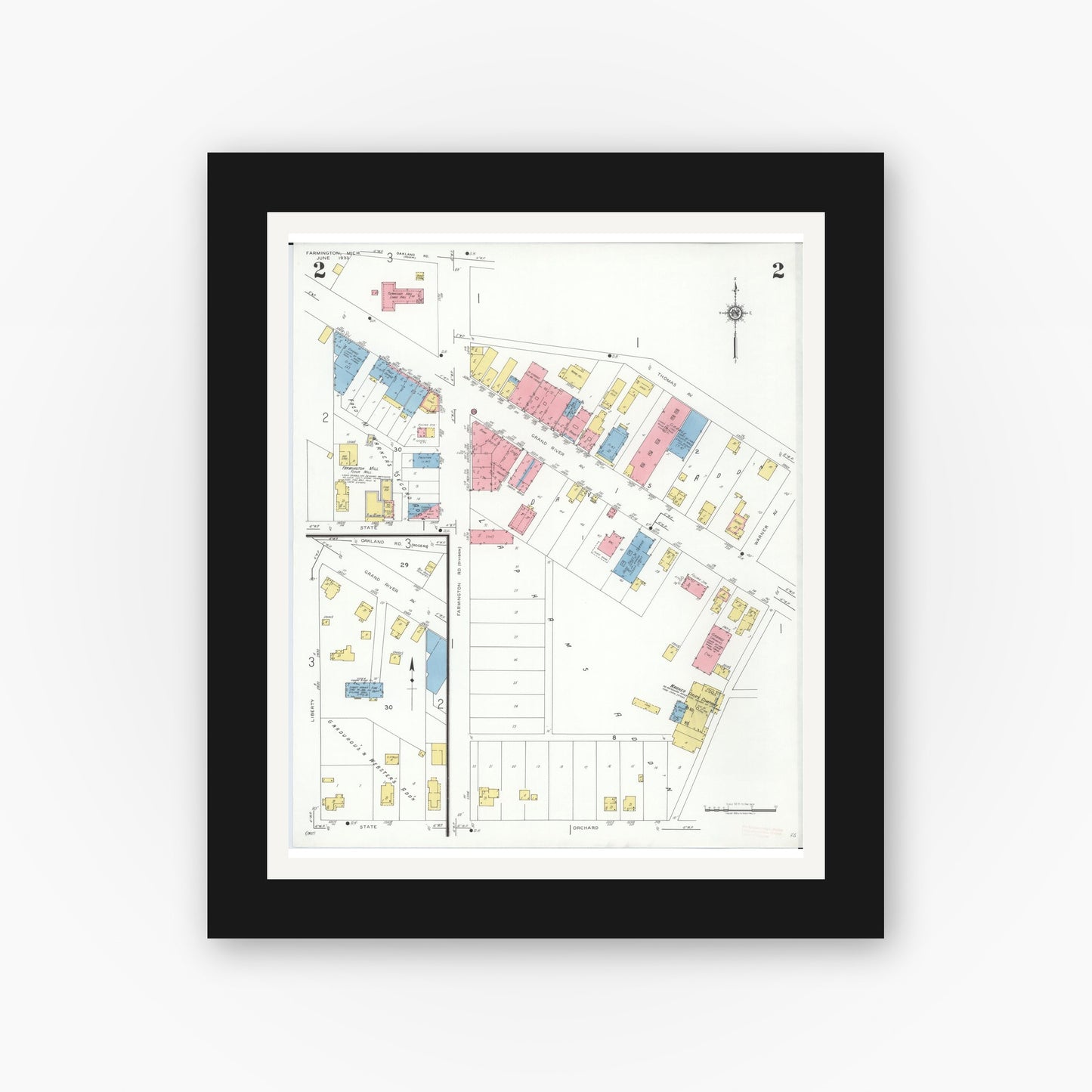 Old map wall art mockup — black gallery frame with white mat — Sanborn Fire Insurance Map from Farmington, Oakland County, Michigan (1933), Sheet #0002