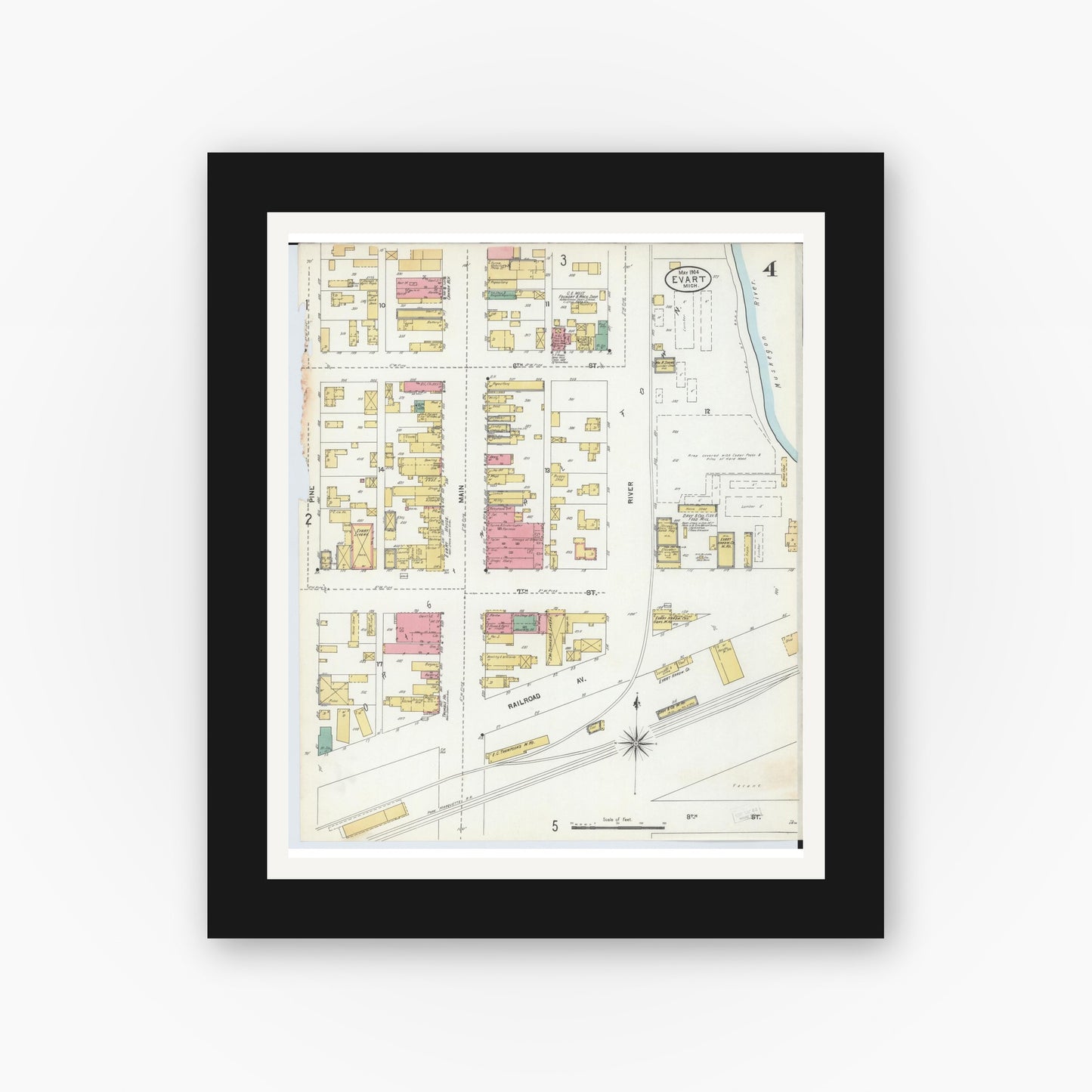 Old map wall art mockup — black gallery frame with white mat — Sanborn Fire Insurance Map from Evart, Osceola County, Michigan (1904), Sheet #0004