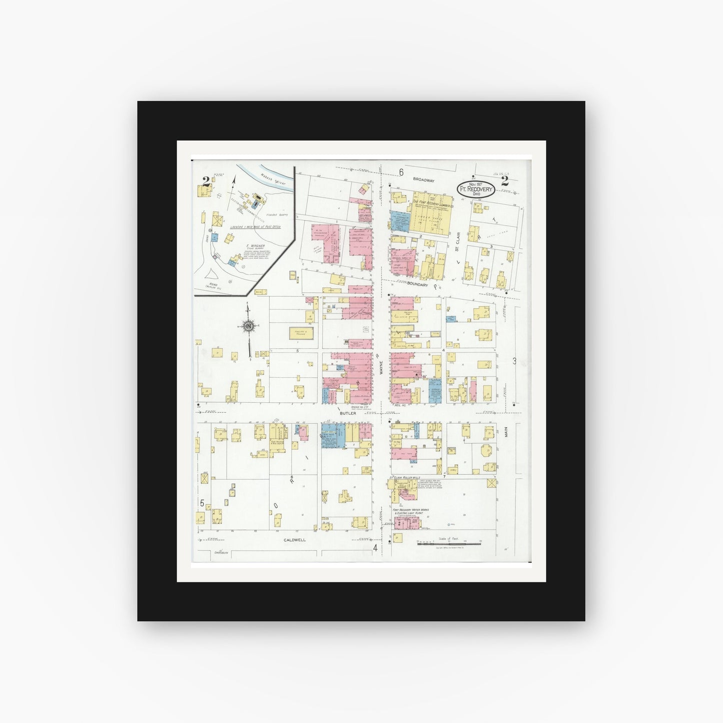 Old map wall art mockup — black gallery frame with white mat — Sanborn Fire Insurance Map from Fort Recovery, Mercer County, Ohio (1927), Sheet #0002