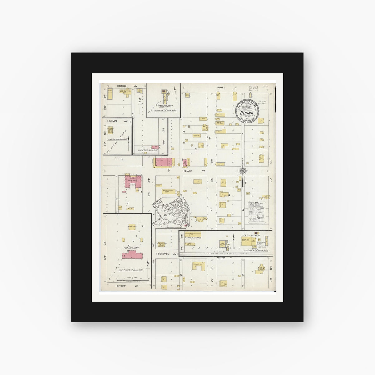 Old map wall art mockup — black gallery frame with white mat — Sanborn Fire Insurance Map from Donna, Hidalgo County, Texas (1917), Sheet #0001
