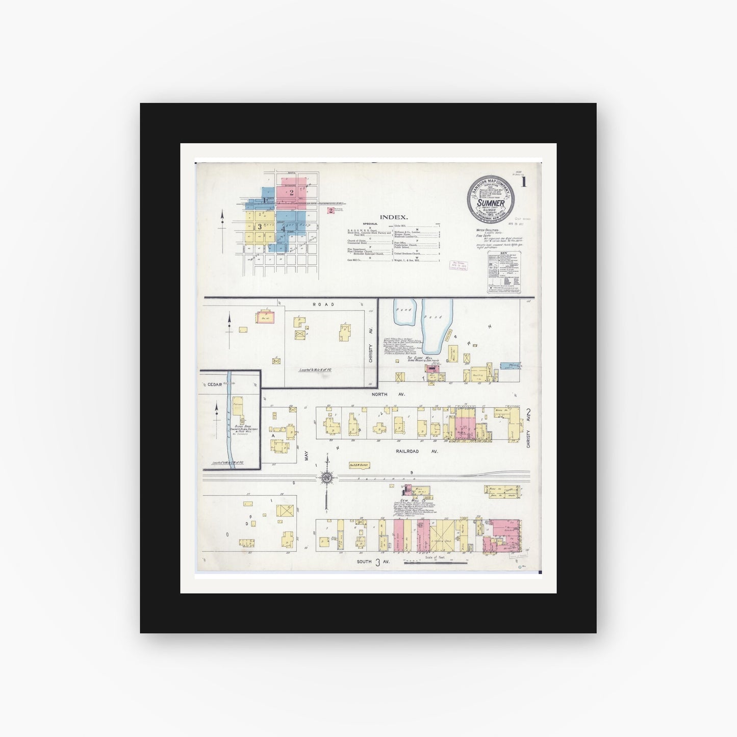 Old map wall art mockup — black gallery frame with white mat — Sanborn Fire Insurance Map from Sumner, Lawrence County, Illinois (1912), Sheet #0001