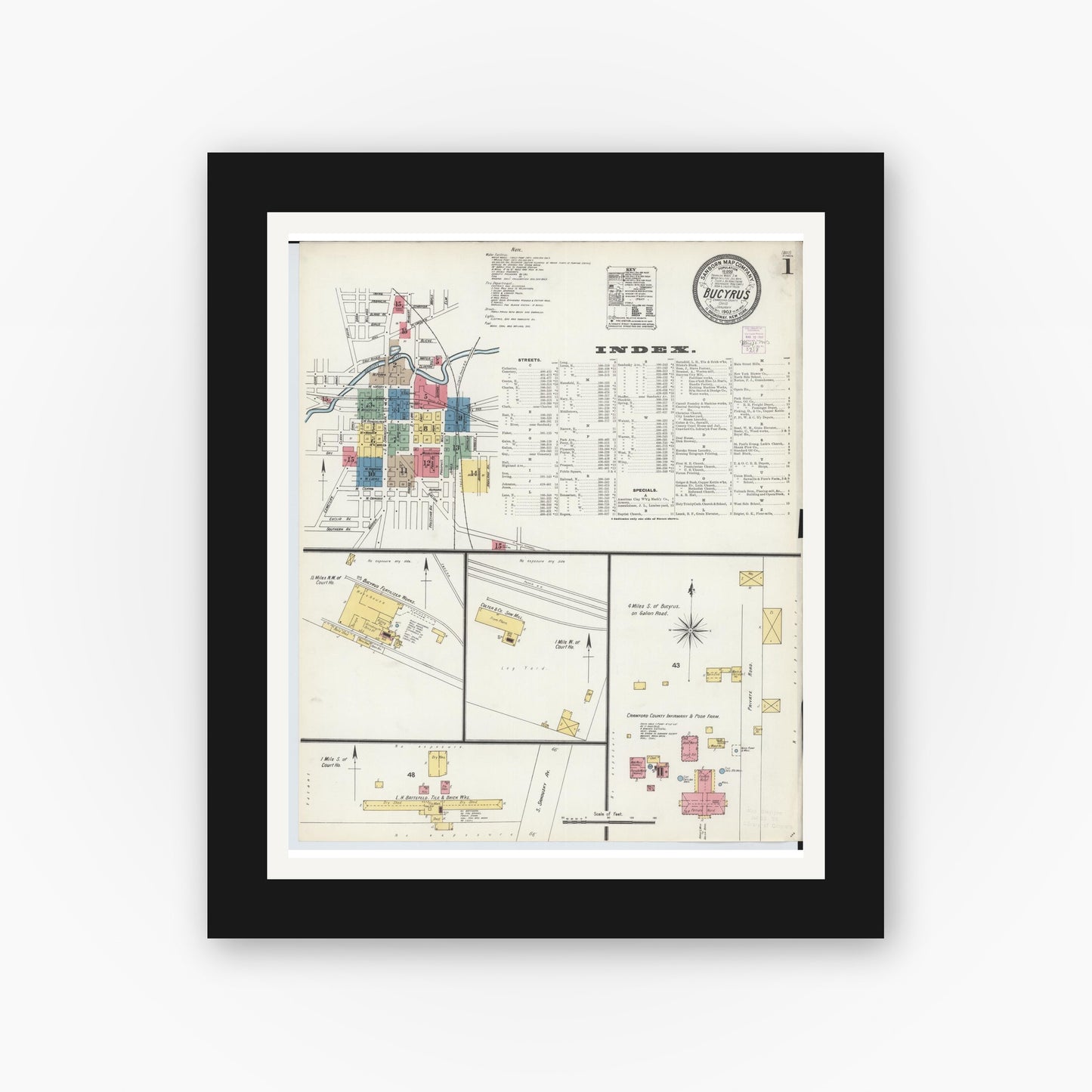 Old map wall art mockup — black gallery frame with white mat — Sanborn Fire Insurance Map from Bucyrus, Crawford County, Ohio (1903), Sheet #0001