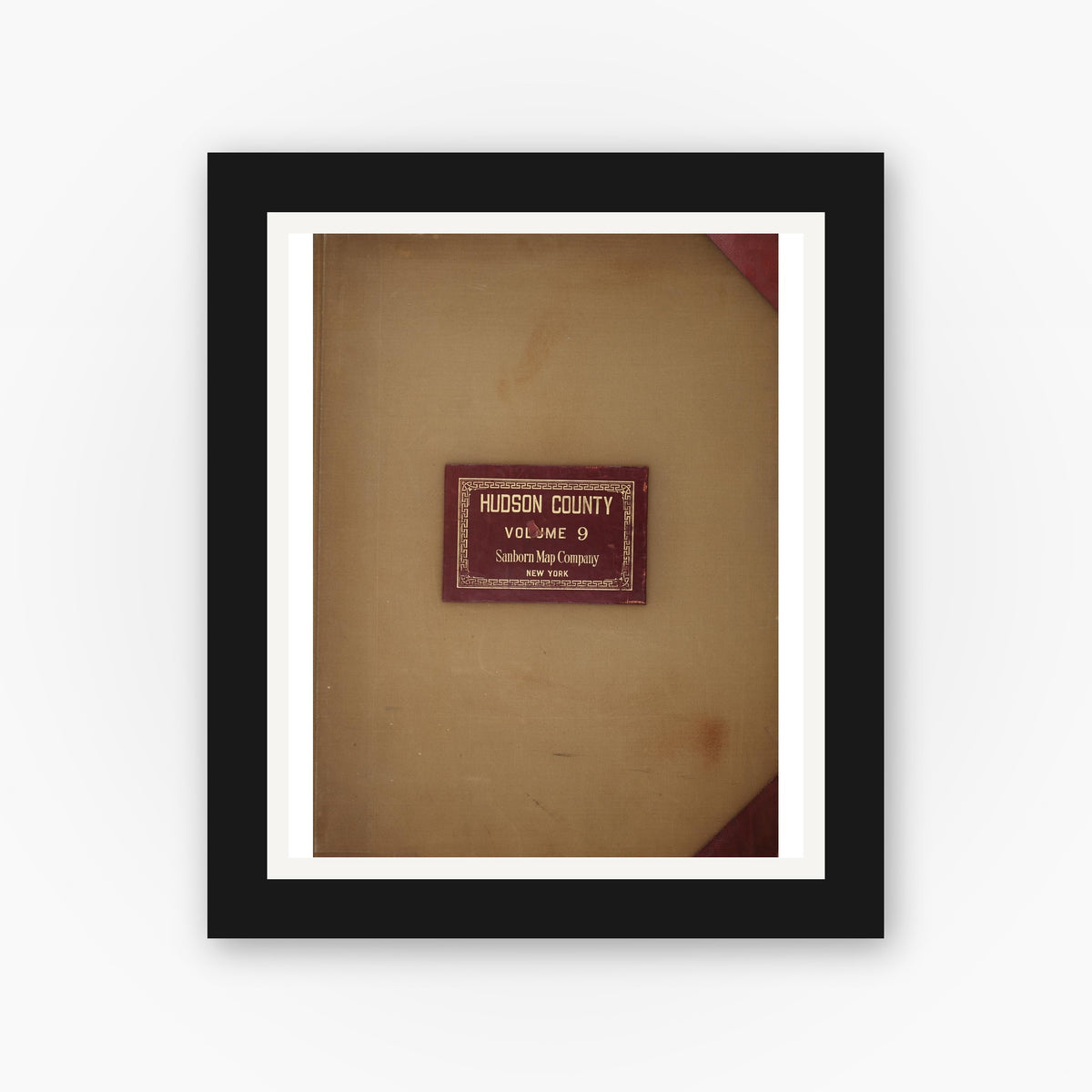 Old map wall art mockup — black gallery frame with white mat — Sanborn Fire Insurance Map from Hudson Co., Hudson County, New Jersey (1950), Sheet #0001