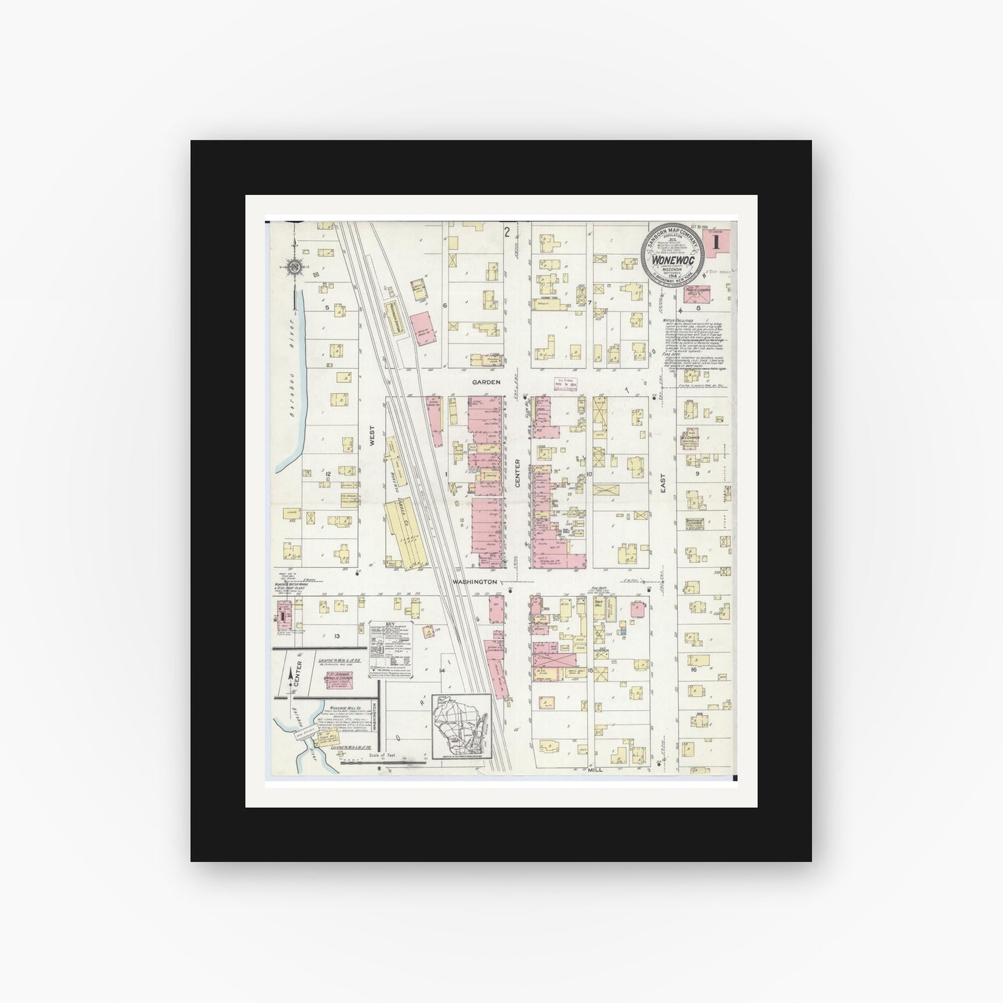 Old map wall art mockup — black gallery frame with white mat — Sanborn Fire Insurance Map from Wonewoc, Juneau County, Wisconsin (1914), Sheet #0001