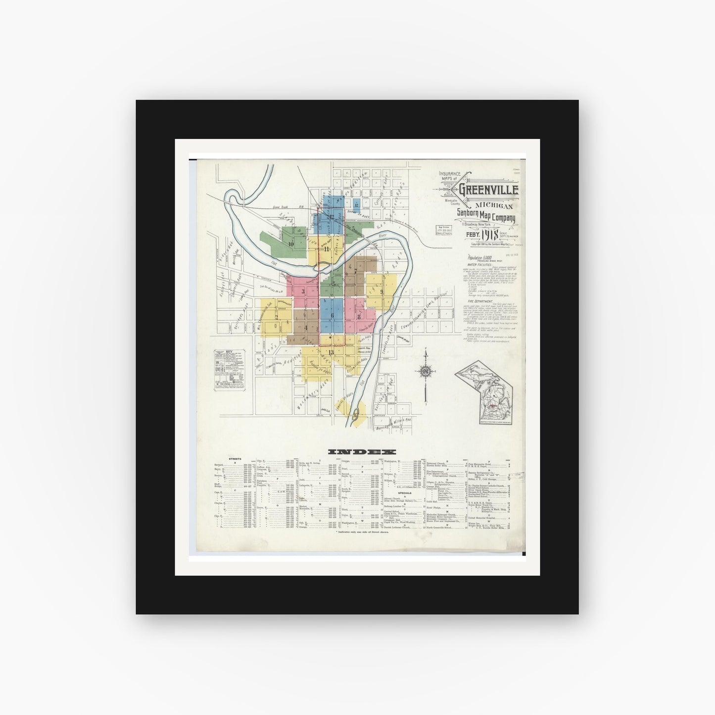 Old map wall art mockup — black gallery frame with white mat — Sanborn Fire Insurance Map from Greenville, Montcalm County, Michigan (1918) - Complete Map Set