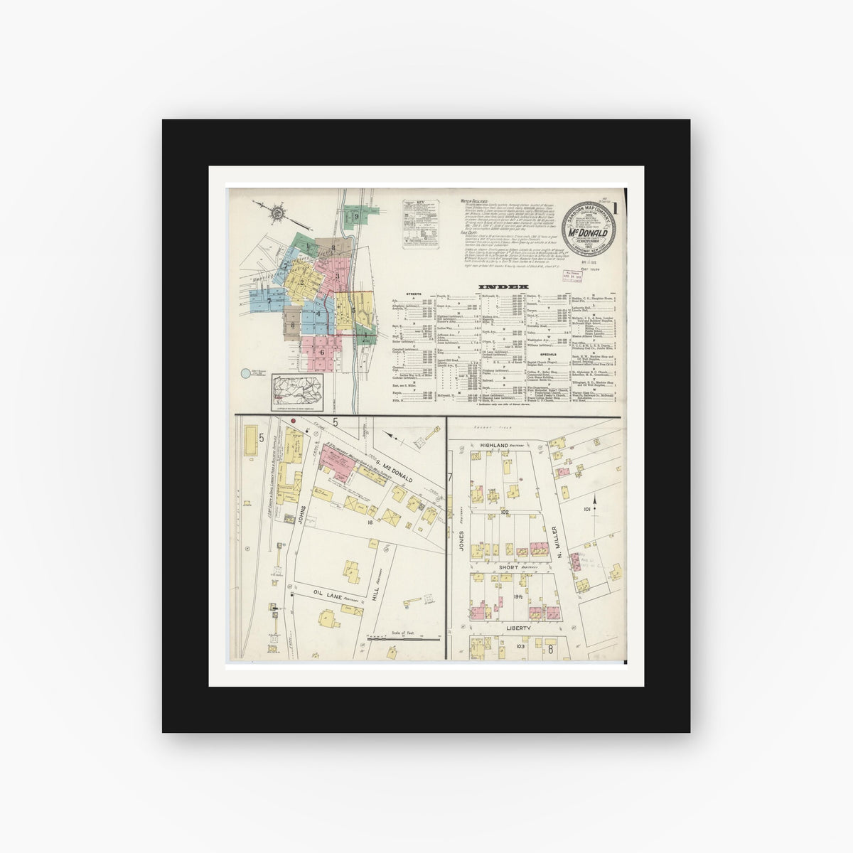Old map wall art mockup — black gallery frame with white mat — Sanborn Fire Insurance Map from McDonald, Washington County, Pennsylvania (1915), Sheet #0001