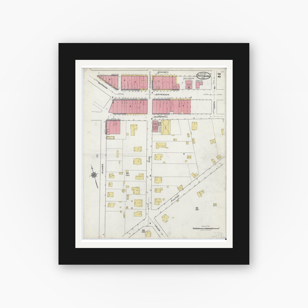 Old map wall art mockup — black gallery frame with white mat — Sanborn Fire Insurance Map from Pittsburg, Camp County, Texas (1921), Sheet #0002