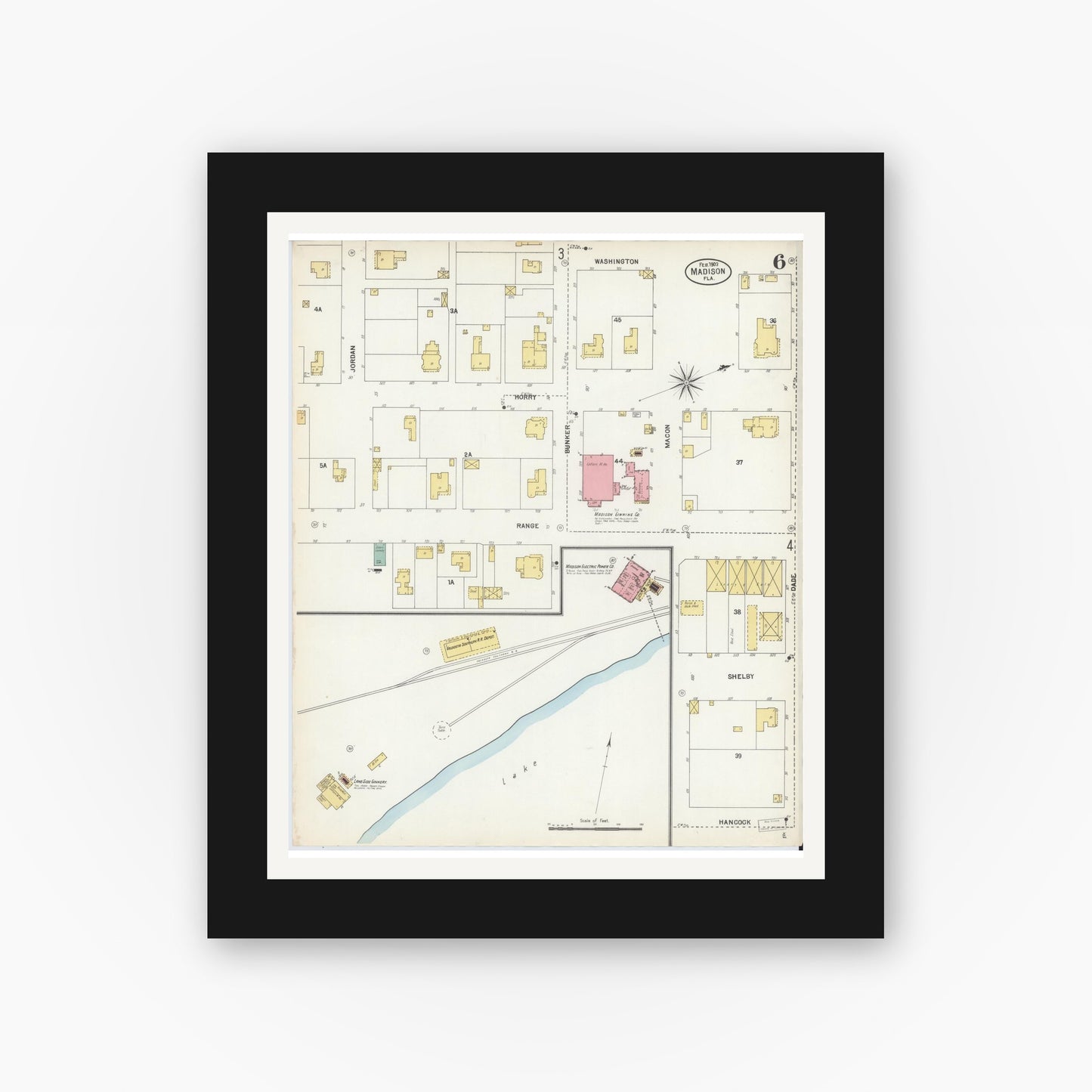 Old map wall art mockup — black gallery frame with white mat — Sanborn Fire Insurance Map from Madison, Madison County, Florida (1903), Sheet #0006
