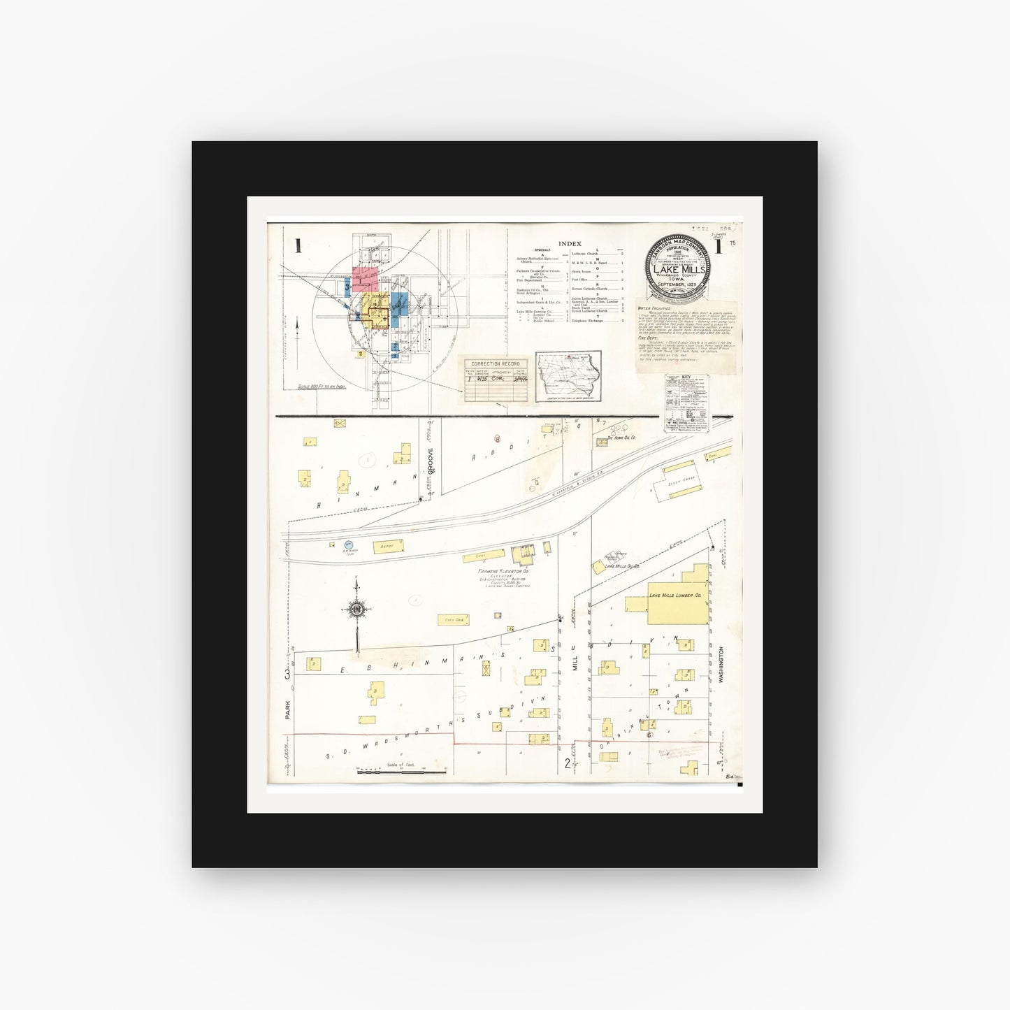 Old map wall art mockup — black gallery frame with white mat — Sanborn Fire Insurance Map from Lake Mills, Winnebago County, Iowa (1935), Sheet #0001