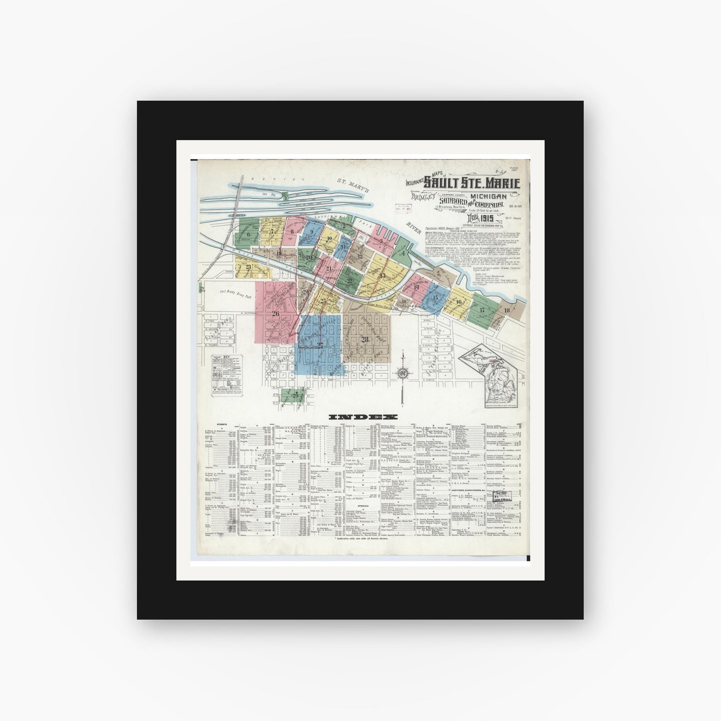 Old map wall art mockup — black gallery frame with white mat — Sanborn Fire Insurance Map from Sault Sainte Marie, Chippewa County, Michigan (1915) - Complete Map Set