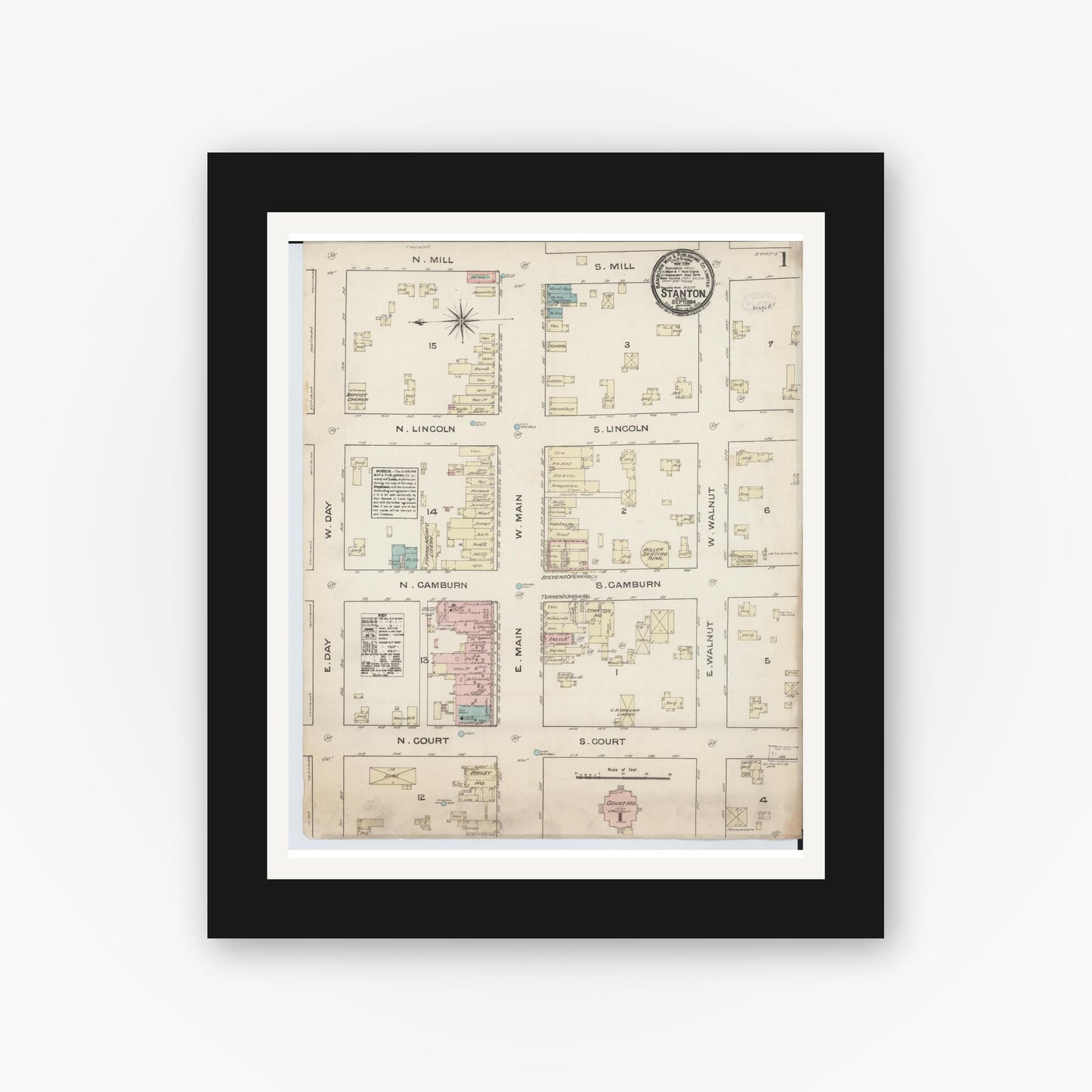Old map wall art mockup — black gallery frame with white mat — Sanborn Fire Insurance Map from Stanton, Montcalm County, Michigan (1884) - Complete Map Set
