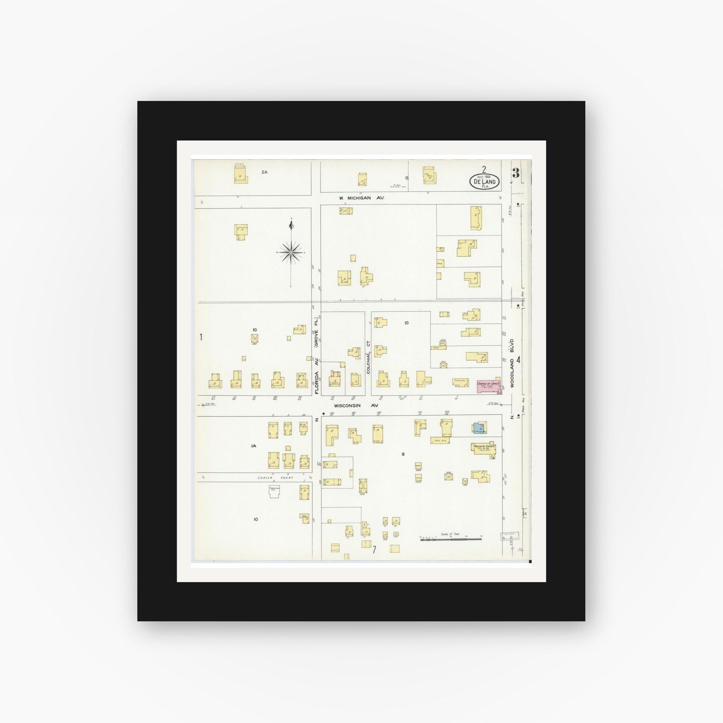 Old map wall art mockup — black gallery frame with white mat — Sanborn Fire Insurance Map from De Land, Volusia County, Florida (1909), Sheet #0003