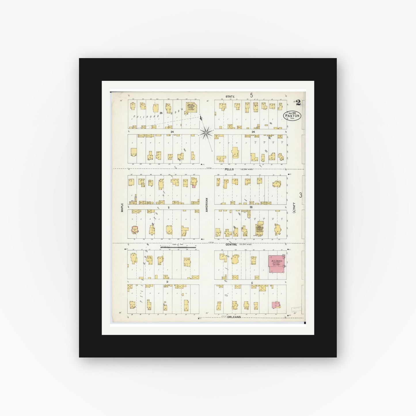 Old map wall art mockup — black gallery frame with white mat — Sanborn Fire Insurance Map from Paxton, Ford County, Illinois (1902), Sheet #0002