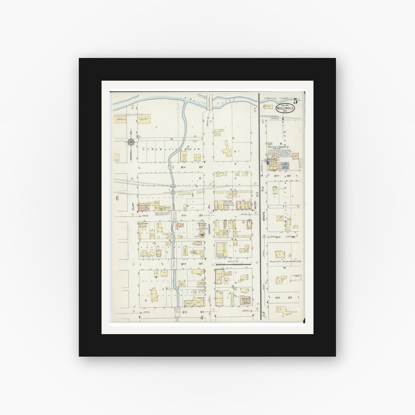 Old map wall art mockup — black gallery frame with white mat — Sanborn Fire Insurance Map from Neillsville, Clark County, Wisconsin (1914), Sheet #0005