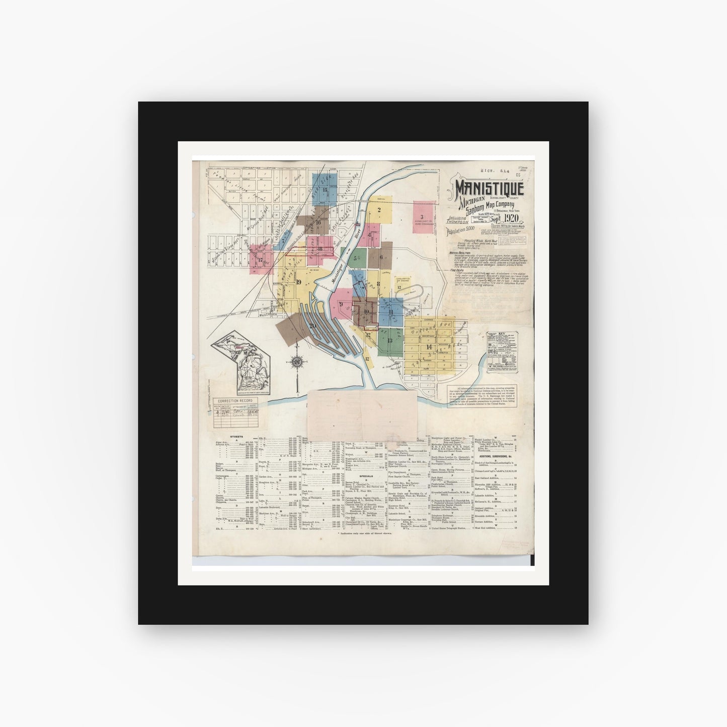 Old map wall art mockup — black gallery frame with white mat — Sanborn Fire Insurance Map from Manistique, Schoolcraft County, Michigan (1950) - Complete Map Set
