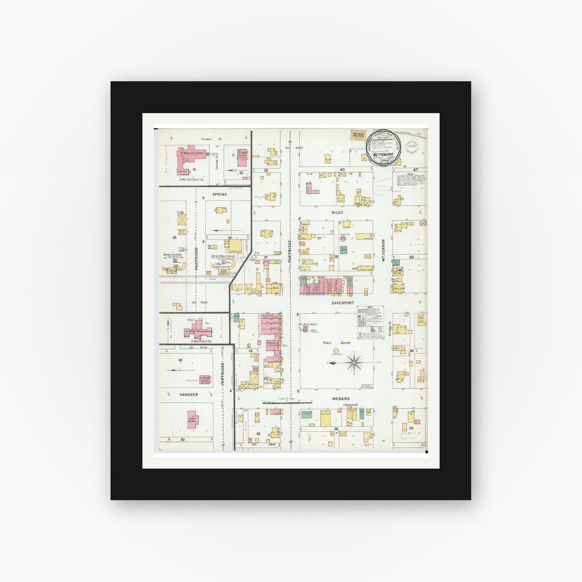 Old map wall art mockup — black gallery frame with white mat — Sanborn Fire Insurance Map from Metamora, Woodford County, Illinois (1899), Sheet #0001