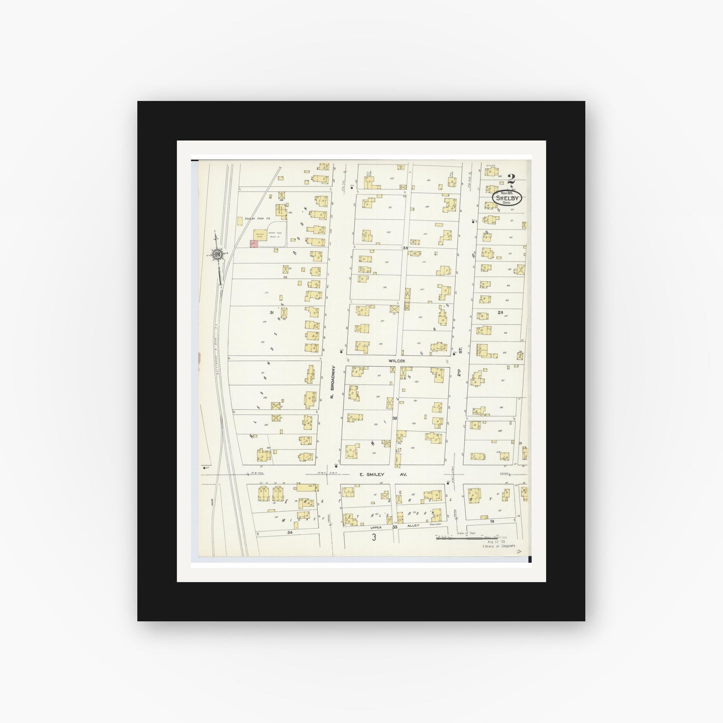 Old map wall art mockup — black gallery frame with white mat — Sanborn Fire Insurance Map from Shelby, Richland County, Ohio (1911), Sheet #0002