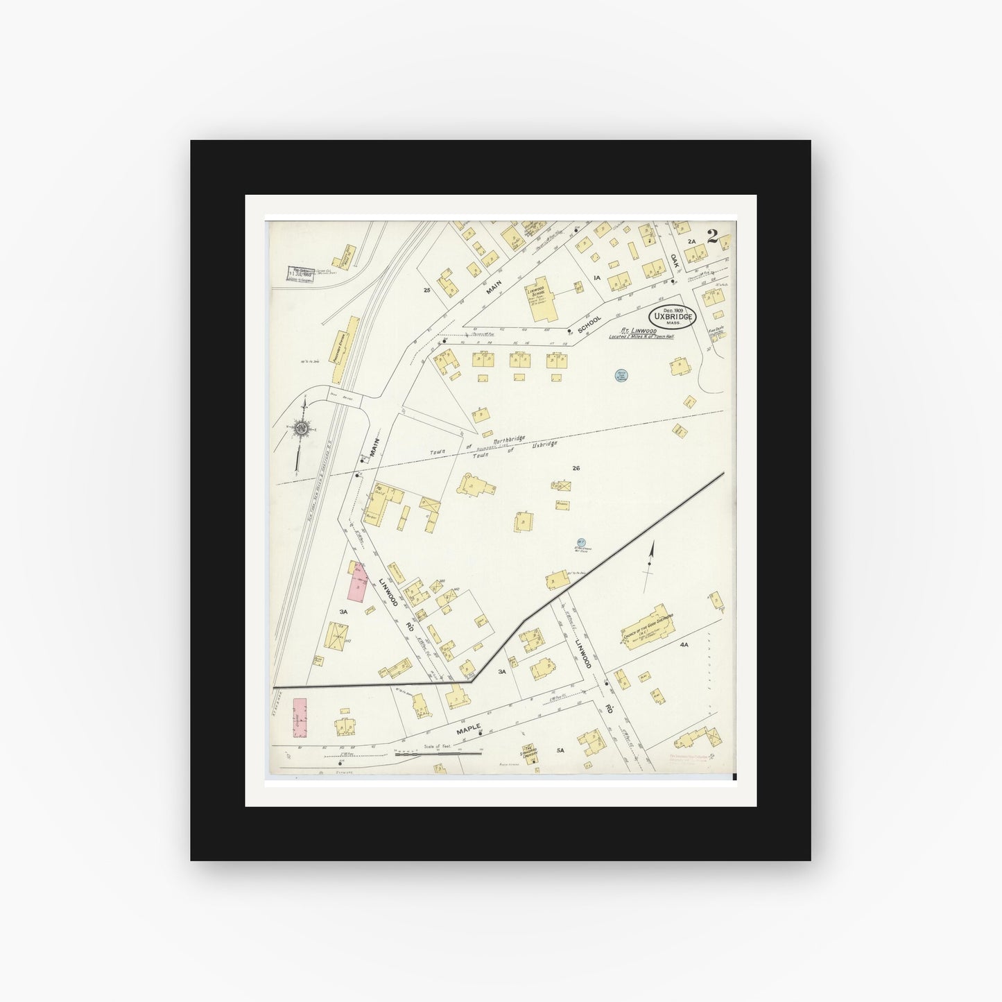 Old map wall art mockup — black gallery frame with white mat — Sanborn Fire Insurance Map from Uxbridge, Worcester County, Massachusetts (1909), Sheet #0002