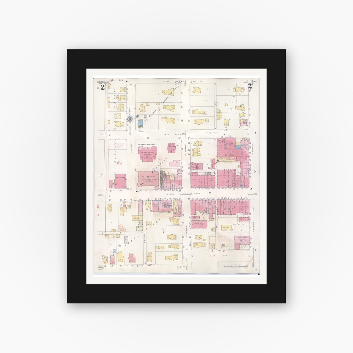 Old map wall art mockup — black gallery frame with white mat — Sanborn Fire Insurance Map from Shelbyville, Shelby County, Illinois (1941), Sheet #0002