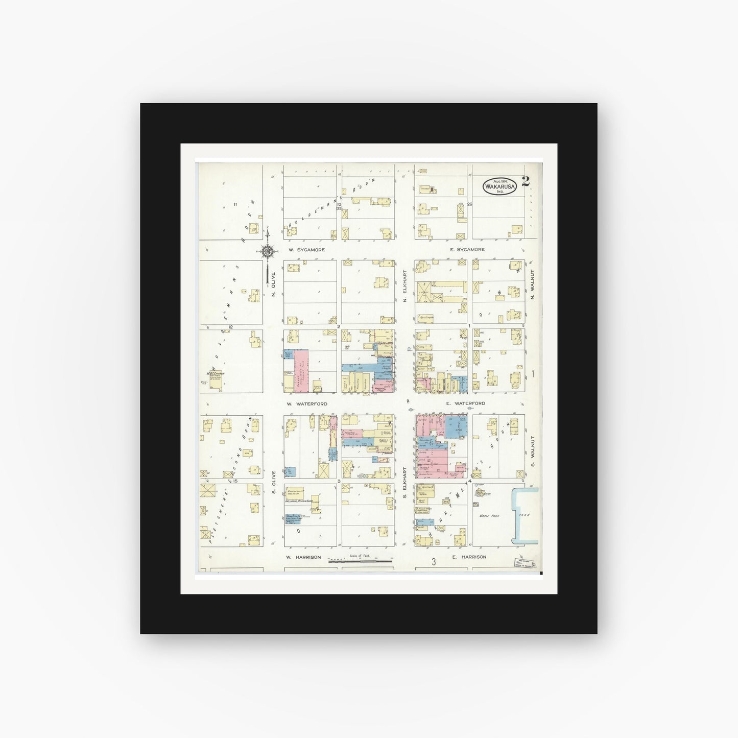Old map wall art mockup — black gallery frame with white mat — Sanborn Fire Insurance Map from Wakarusa, Elkhart County, Indiana (1914), Sheet #0002