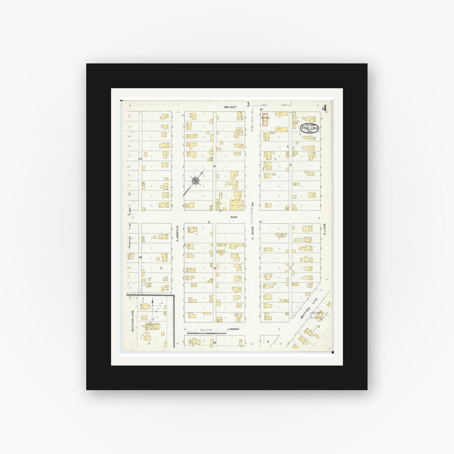 Old map wall art mockup — black gallery frame with white mat — Sanborn Fire Insurance Map from Phillips, Price County, Wisconsin (1909), Sheet #0004