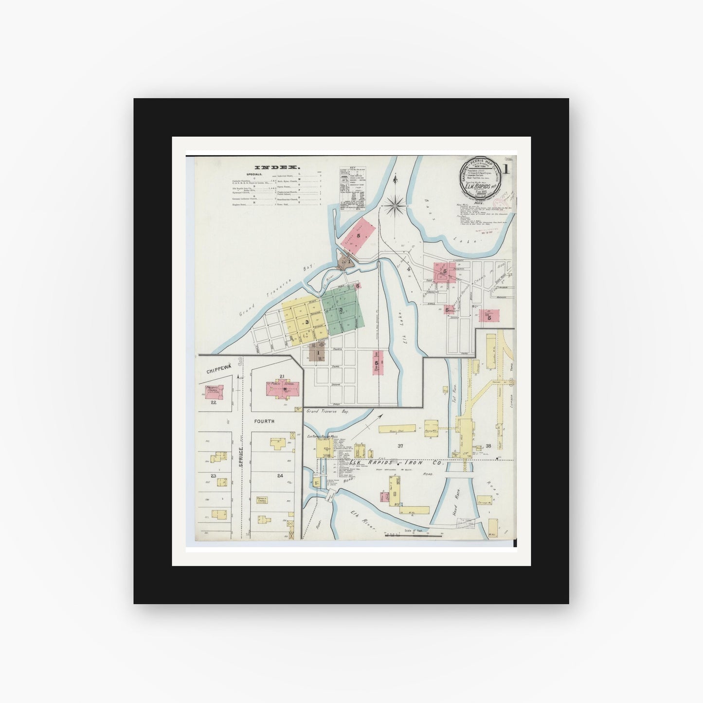 Old map wall art mockup — black gallery frame with white mat — Sanborn Fire Insurance Map from Elk Rapids, Antrim County, Michigan (1895), Sheet #0001