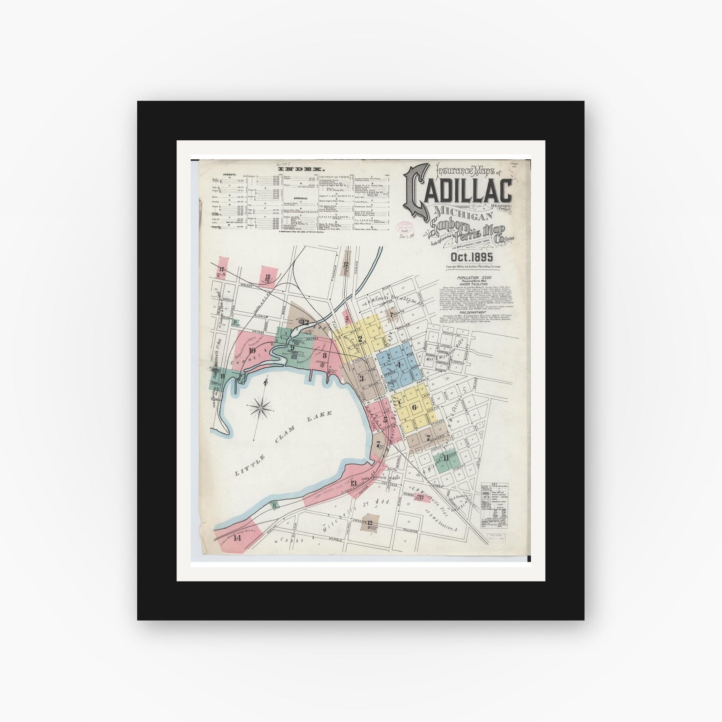 Old map wall art mockup — black gallery frame with white mat — Sanborn Fire Insurance Map from Cadillac, Wexford County, Michigan (1895) - Complete Map Set