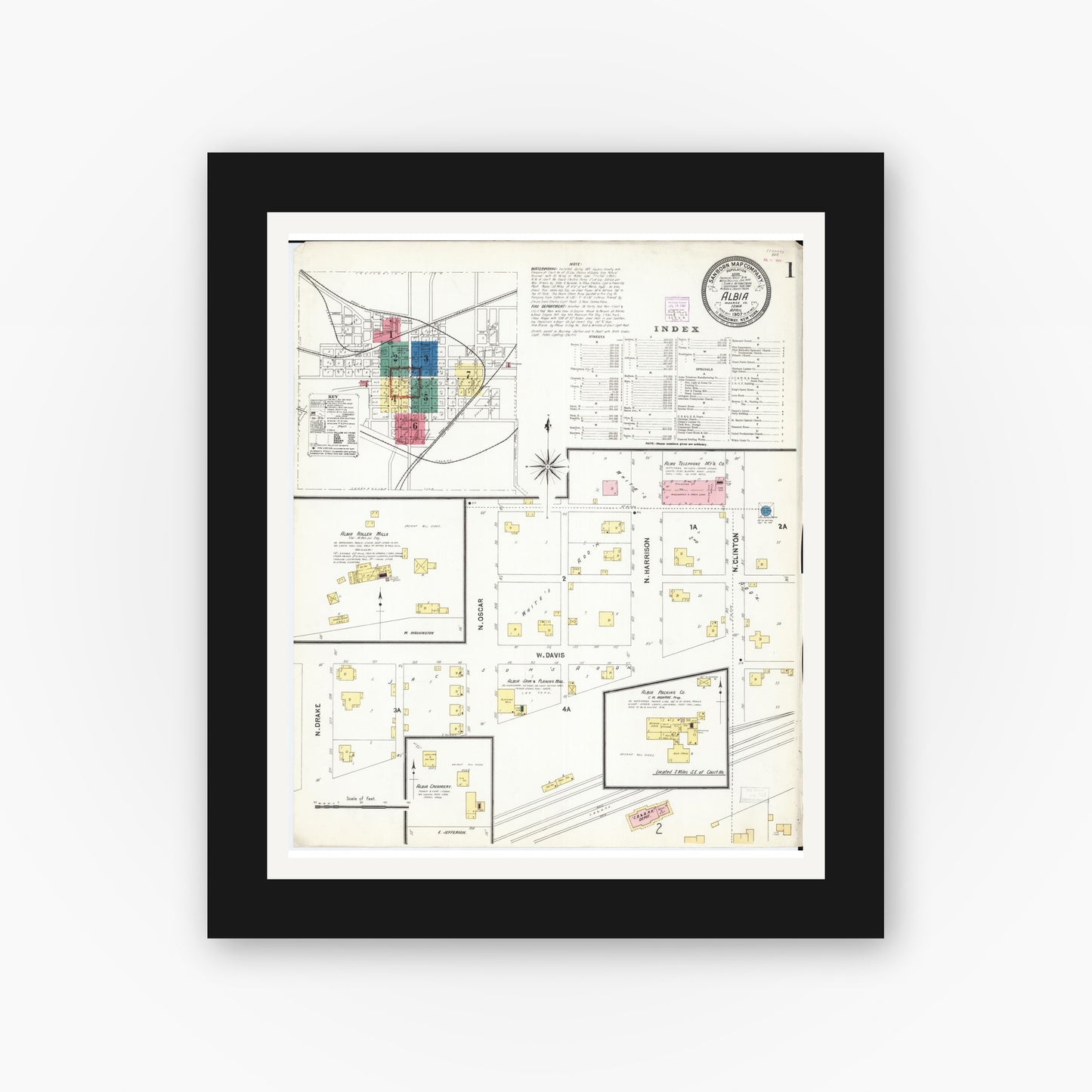 Old map wall art mockup — black gallery frame with white mat — Sanborn Fire Insurance Map from Albia, Monroe County, Iowa (1907) — Complete Set
