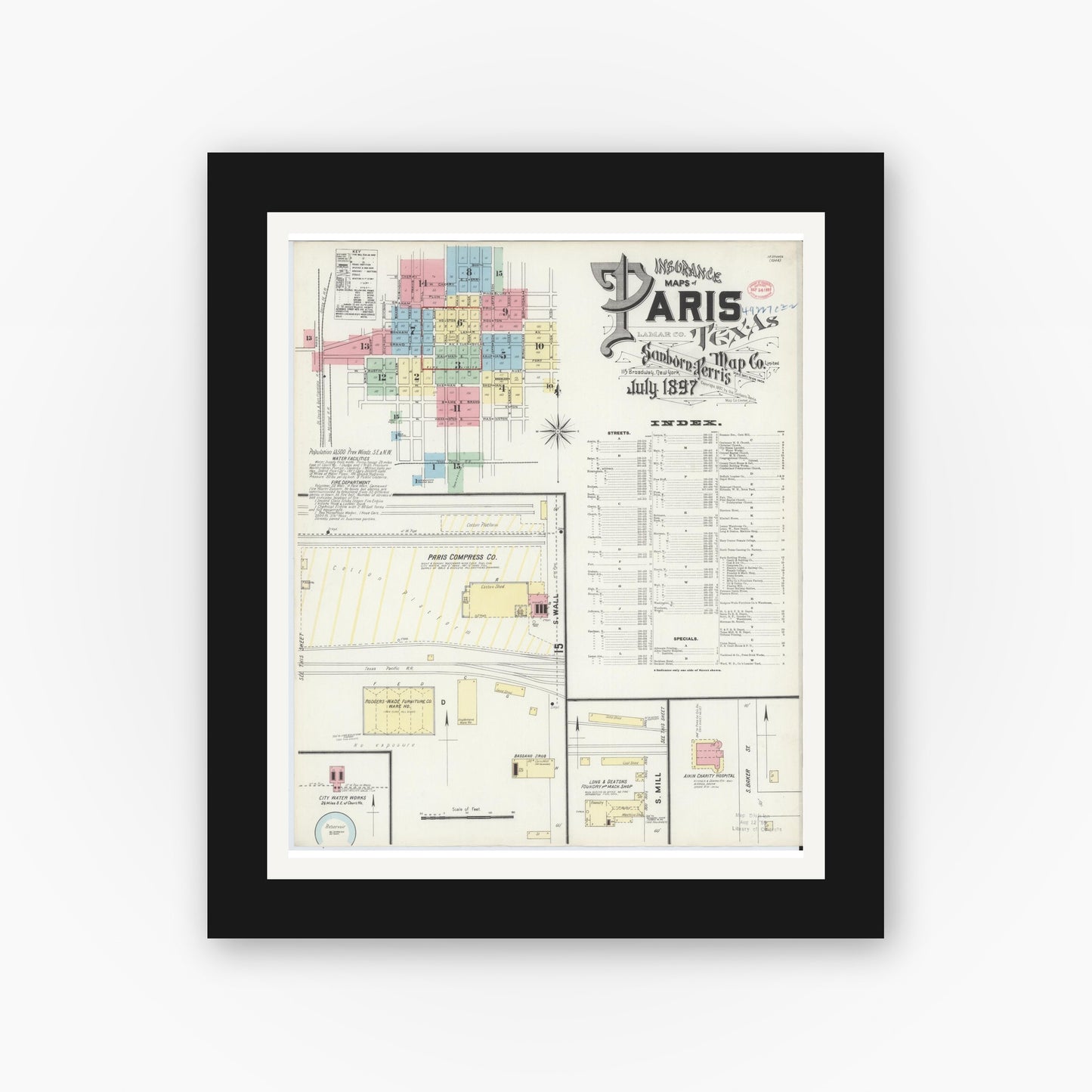 Old map wall art mockup — black gallery frame with white mat — Sanborn Fire Insurance Map from Paris, Lamar County, Texas (1897), Sheet #0001