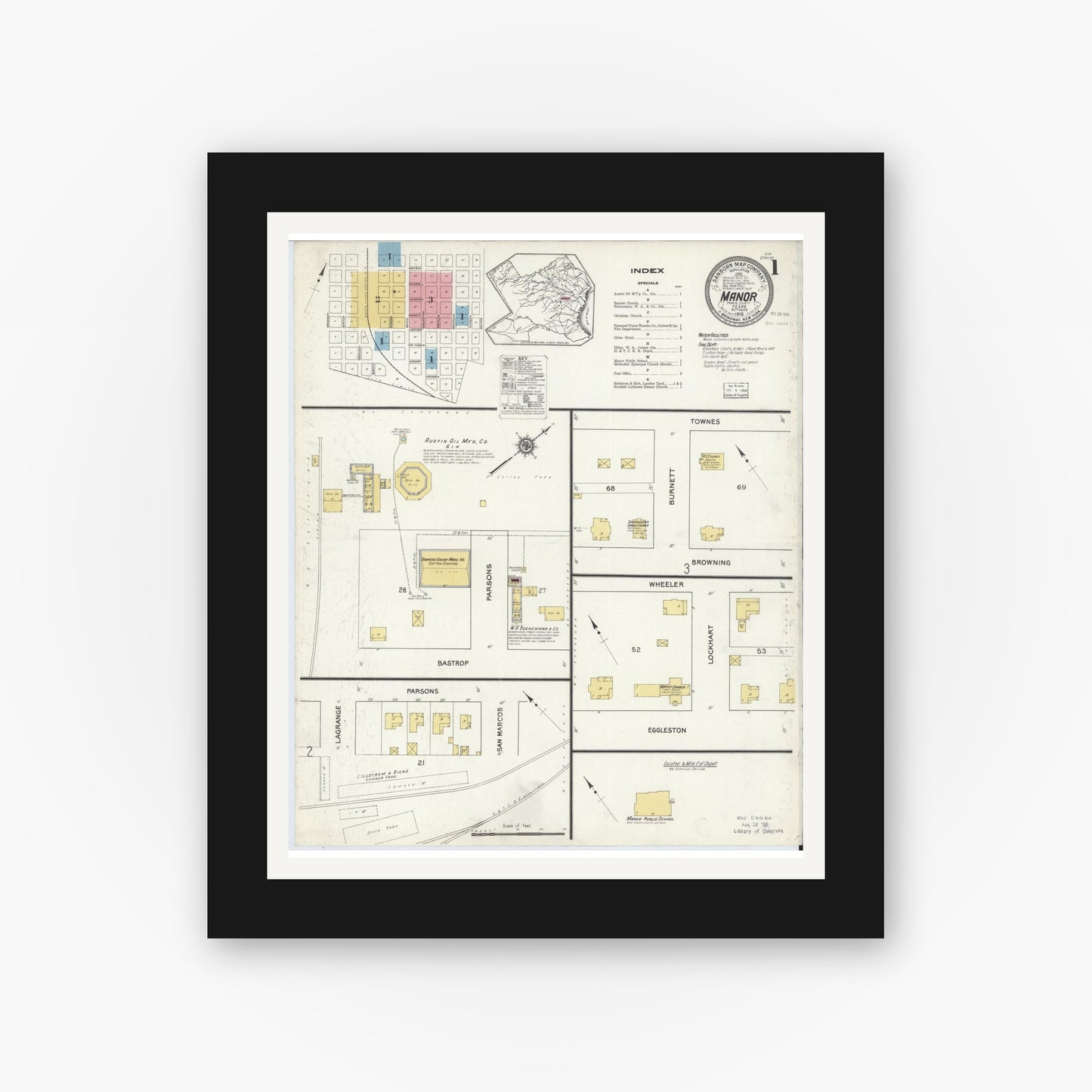 Old map wall art mockup — black gallery frame with white mat — Sanborn Fire Insurance Map from Manor, Travis County, Texas (1916), Sheet #0001