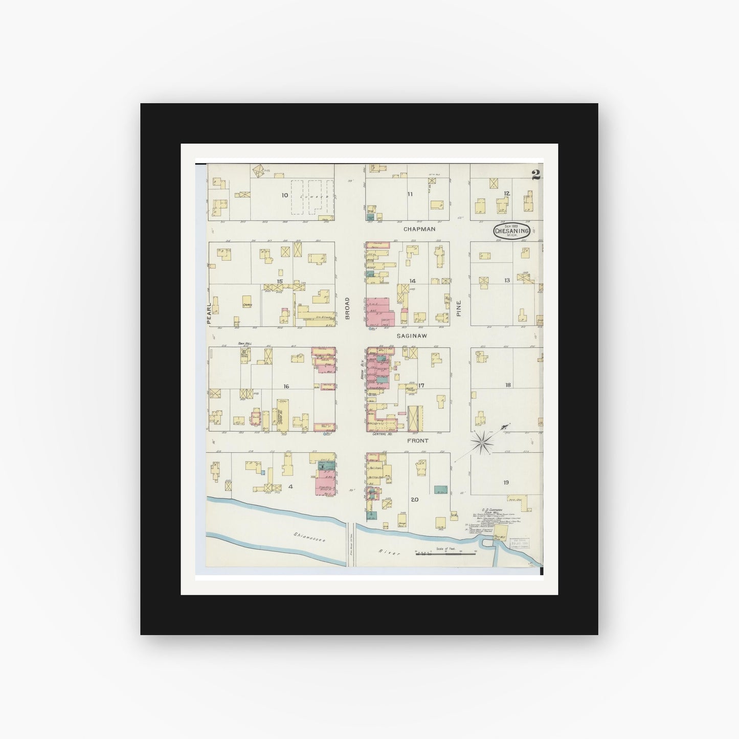 Old map wall art mockup — black gallery frame with white mat — Sanborn Fire Insurance Map from Chesaning, Saginaw County, Michigan (1893), Sheet #0002